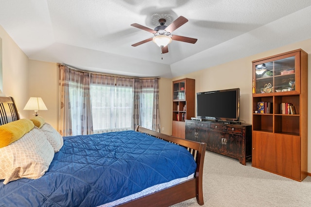 12800 Garrett Ct, Apple Valley, MN 55124 - carpeted bedroom with a raised ceiling and ceiling fan