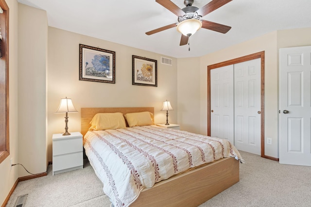 12800 Garrett Ct, Apple Valley, MN 55124 - bedroom featuring light colored carpet, a closet, and baseboards