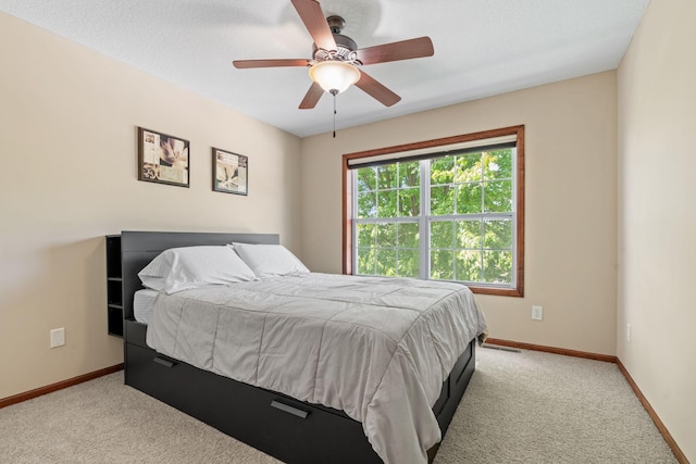 12800 Garrett Ct, Apple Valley, MN 55124 - bedroom featuring carpet flooring, baseboards, and a ceiling fan