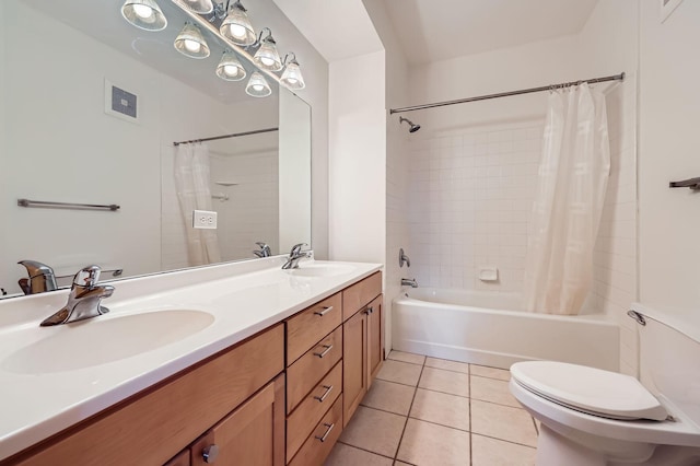 820 Emerald St Unit 402, Saint Paul, MN 55114 - bathroom featuring shower / tub combo with curtain, toilet, tile patterned flooring, and double vanity