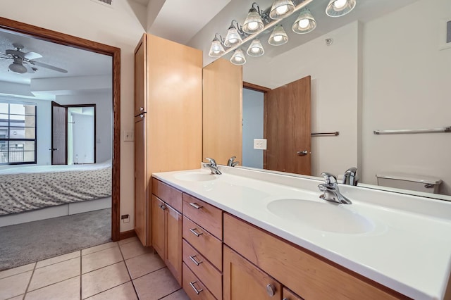 820 Emerald St Unit 402, Saint Paul, MN 55114 - bathroom featuring ensuite bathroom, tile patterned flooring, double vanity, and ceiling fan