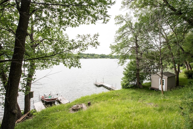 property view of water featuring a boat dock