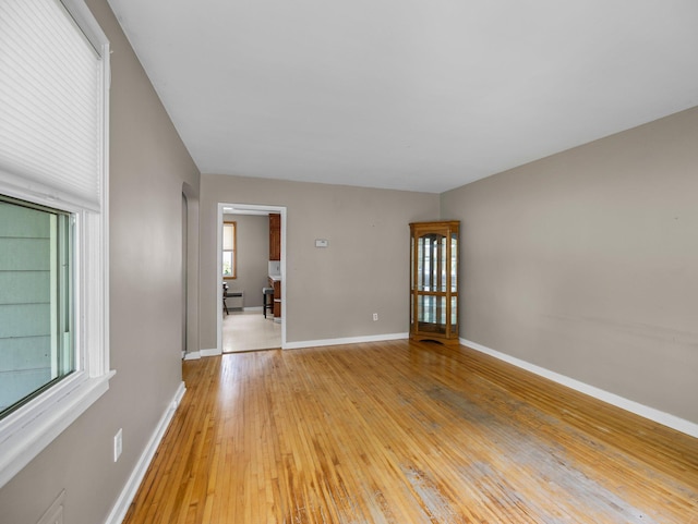 517 Olive St S, Waconia, MN 55387 - empty room with light wood finished floors and baseboards