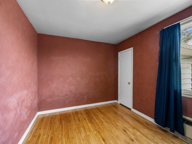 517 Olive St S, Waconia, MN 55387 - unfurnished room featuring light wood-style flooring and baseboards