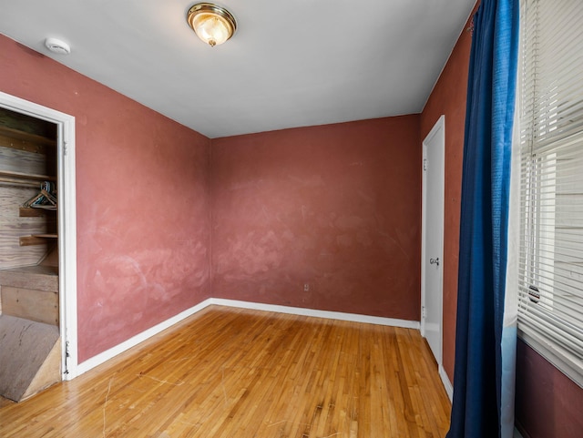 517 Olive St S, Waconia, MN 55387 - spare room featuring light wood-style floors and a smoke detector