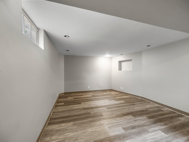 517 Olive St S, Waconia, MN 55387 - below grade area featuring wood finished floors