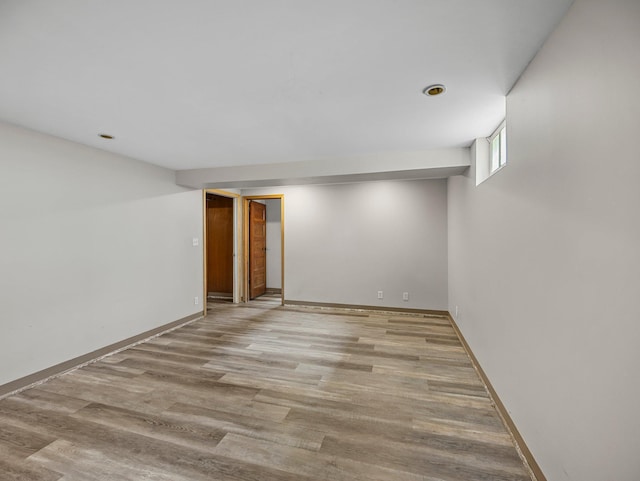 517 Olive St S, Waconia, MN 55387 - basement featuring wood finished floors and baseboards