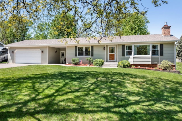 ranch-style house featuring a garage, a chimney, driveway, and a front yard