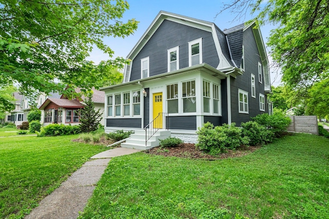 3100 29th Ave S, Minneapolis, MN 55406 - colonial inspired home with entry steps, a gambrel roof, and a front yard