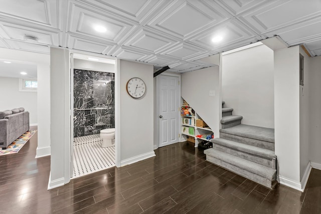 3100 29th Ave S, Minneapolis, MN 55406 - basement with stairway, wood finished floors, baseboards, and recessed lighting