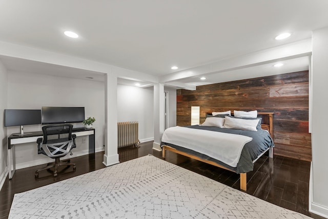 3100 29th Ave S, Minneapolis, MN 55406 - bedroom featuring radiator heating unit, wooden walls, wood finished floors, recessed lighting, and baseboards