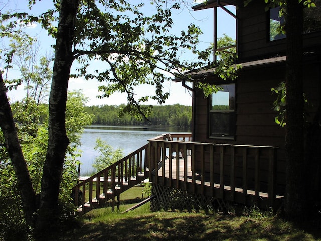 499 Tamarack Ct NE, Tenstrike, MN 56683 - wooden deck with a water view