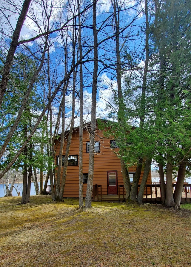 499 Tamarack Ct NE, Tenstrike, MN 56683 - rear view of house with a lawn