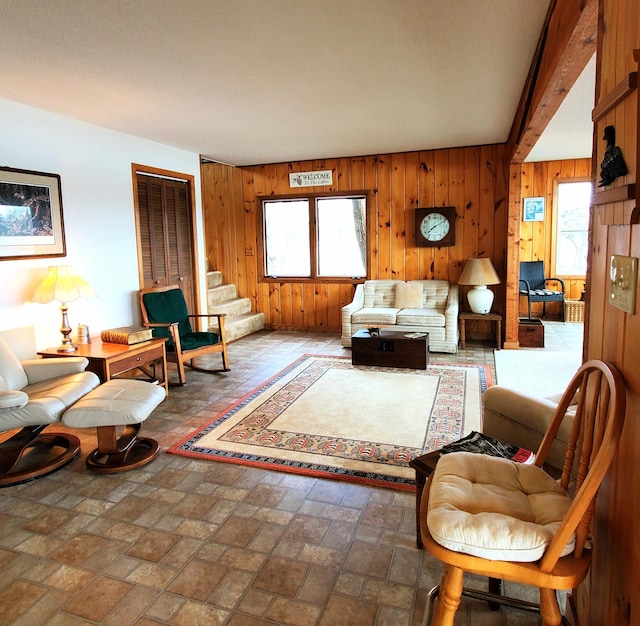 499 Tamarack Ct NE, Tenstrike, MN 56683 - living room with wooden walls and stairway