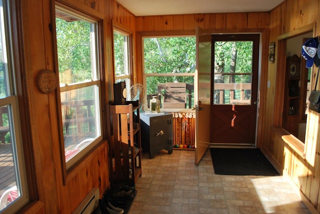 499 Tamarack Ct NE, Tenstrike, MN 56683 - sunroom featuring wood walls