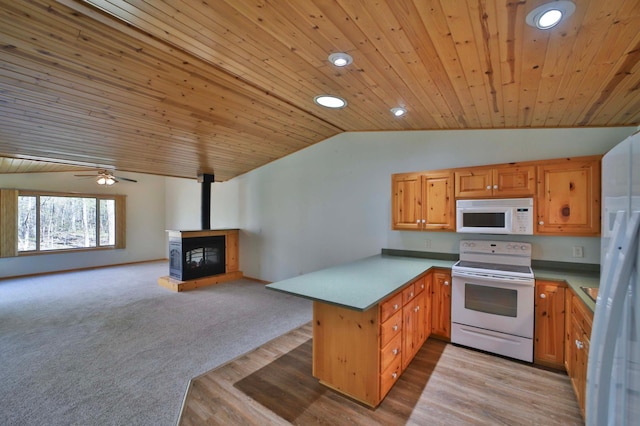 kitchen with white appliances, a peninsula, vaulted ceiling, wood ceiling, and open floor plan