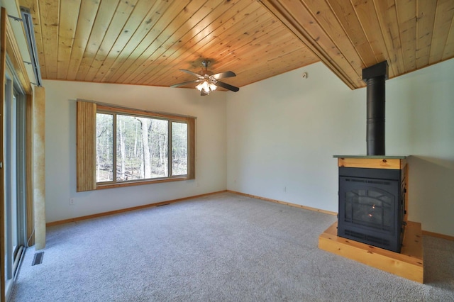 unfurnished living room with wood ceiling, carpet flooring, a ceiling fan, baseboards, and lofted ceiling