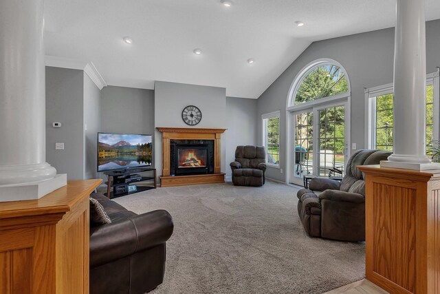 1609 26th St SE, Saint Cloud, MN 56304 - living room with decorative columns, a fireplace, carpet floors, recessed lighting, and high vaulted ceiling