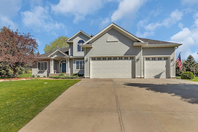 1609 26th St SE, Saint Cloud, MN 56304 - view of front of home featuring an attached garage, driveway, and a front yard