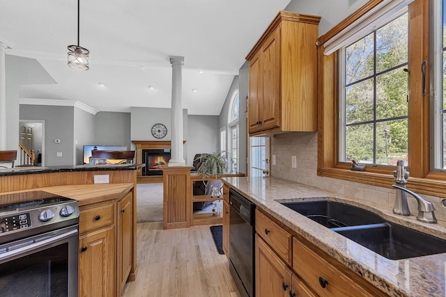 1609 26th St SE, Saint Cloud, MN 56304 - kitchen featuring decorative columns, stainless steel range with electric cooktop, dishwasher, a sink, and light wood finished floors