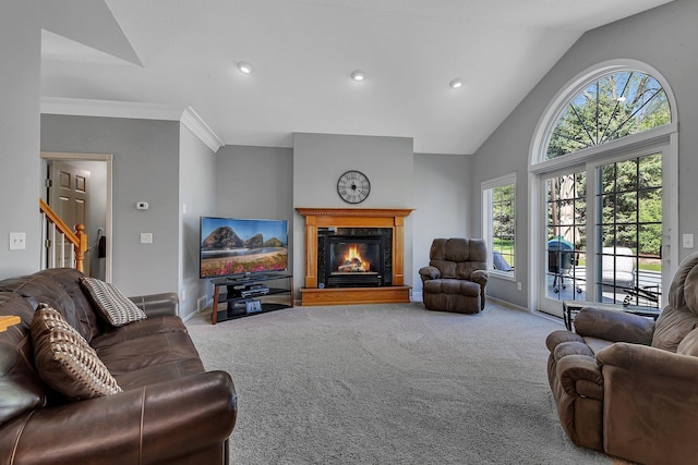 1609 26th St SE, Saint Cloud, MN 56304 - living room with carpet flooring, a fireplace, lofted ceiling, recessed lighting, and stairs