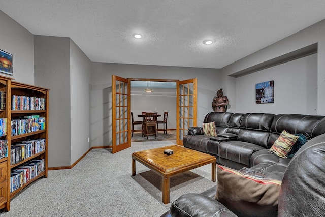 1609 26th St SE, Saint Cloud, MN 56304 - living area featuring carpet, baseboards, a textured ceiling, recessed lighting, and french doors