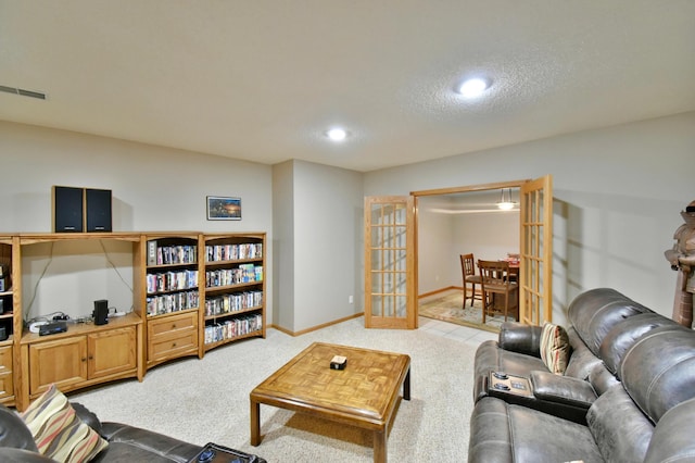 1609 26th St SE, Saint Cloud, MN 56304 - living area with light carpet, baseboards, and recessed lighting
