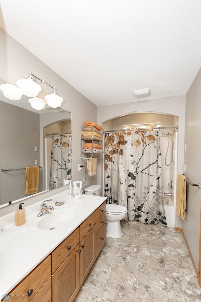 full bath with toilet, vanity, and shower / bath combination with curtain