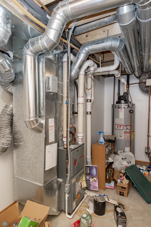 utility room with gas water heater