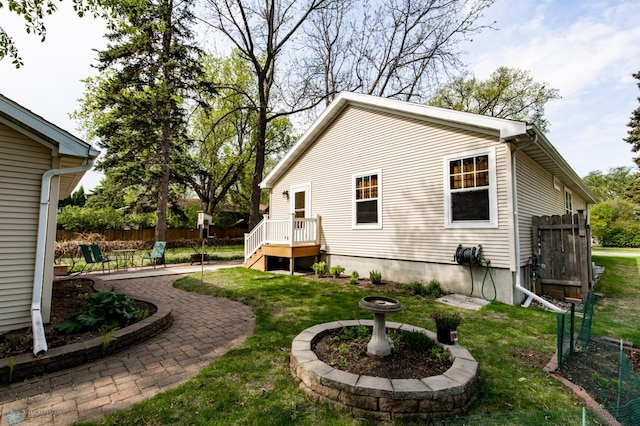 view of property exterior with a patio