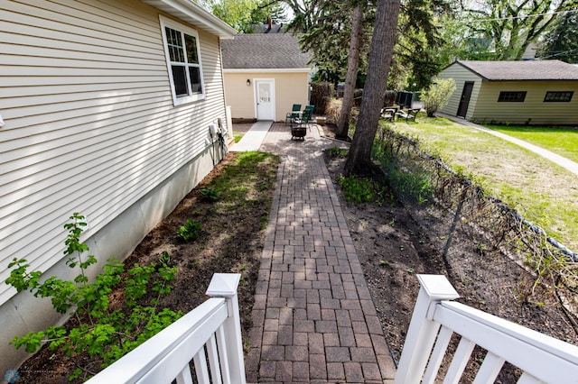 view of yard with fence and a patio
