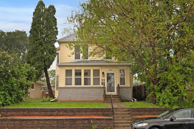 1925 Glenwood Ave, Minneapolis, MN 55405 - view of front of house featuring entry steps and brick siding