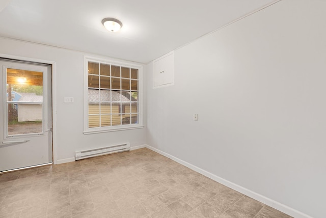 1925 Glenwood Ave, Minneapolis, MN 55405 - empty room featuring a baseboard heating unit and baseboards