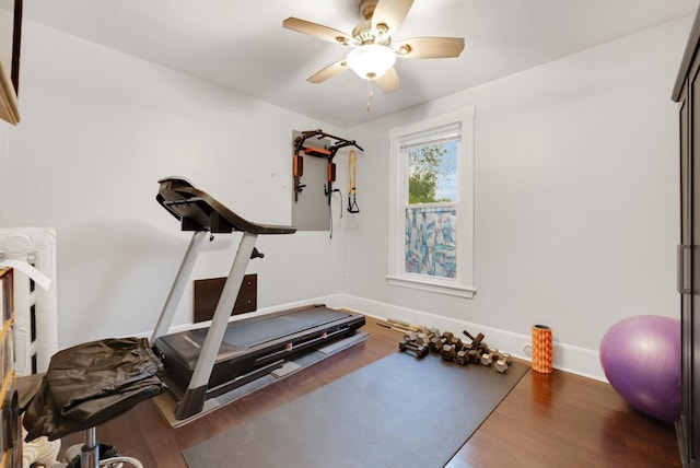 1925 Glenwood Ave, Minneapolis, MN 55405 - exercise room featuring a ceiling fan, wood finished floors, and baseboards