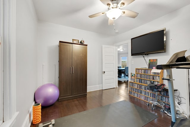 1925 Glenwood Ave, Minneapolis, MN 55405 - workout area with wood finished floors, a ceiling fan, and baseboards