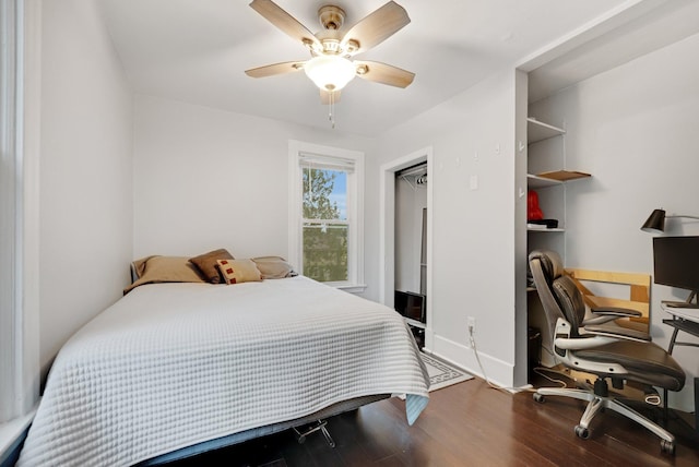 1925 Glenwood Ave, Minneapolis, MN 55405 - bedroom with wood finished floors, an office area, and a ceiling fan