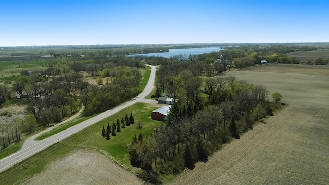 aerial view featuring a rural view and a water view