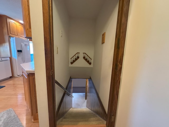 stairway with wood finished floors