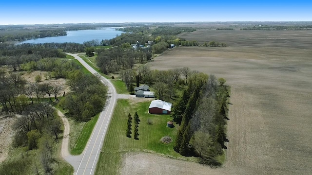 view of property location with a nearby body of water and rural landscape