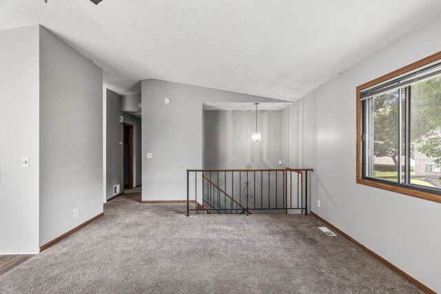 1260 Ferndale St N, Maplewood, MN 55119 - carpeted spare room with baseboards and a textured ceiling