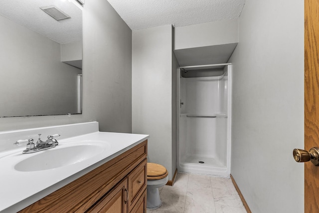 1260 Ferndale St N, Maplewood, MN 55119 - full bathroom with toilet, a stall shower, marble finish flooring, baseboards, and vanity