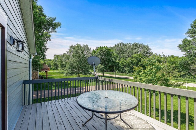 1260 Ferndale St N, Maplewood, MN 55119 - deck featuring a lawn