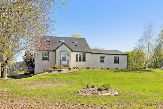 7146 Military Rd, Woodbury, MN 55129 - view of front of property featuring a front yard and stucco siding