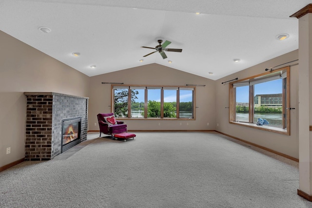 22 13th St S, Sauk Rapids, MN 56379 - living area with carpet, vaulted ceiling, and healthy amount of natural light