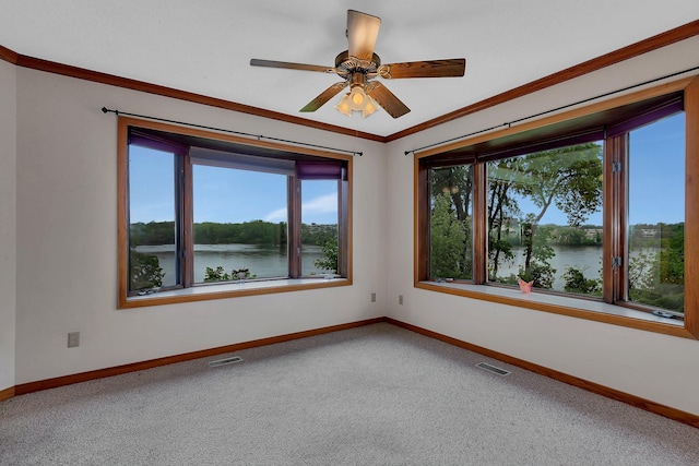 22 13th St S, Sauk Rapids, MN 56379 - carpeted spare room featuring baseboards, a water view, ceiling fan, and crown molding