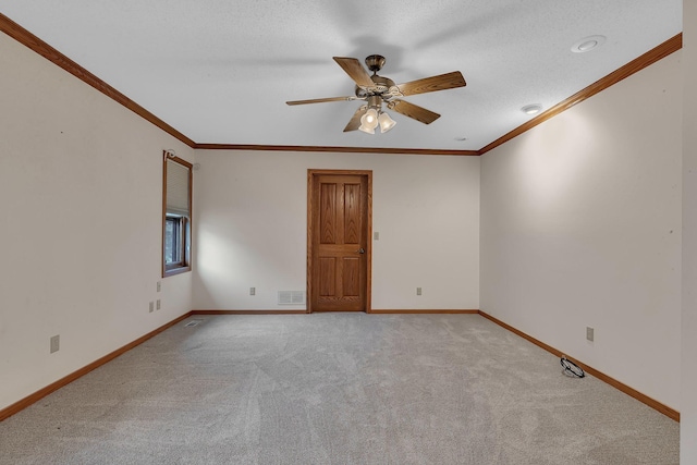 22 13th St S, Sauk Rapids, MN 56379 - empty room featuring a ceiling fan, light colored carpet, baseboards, and crown molding