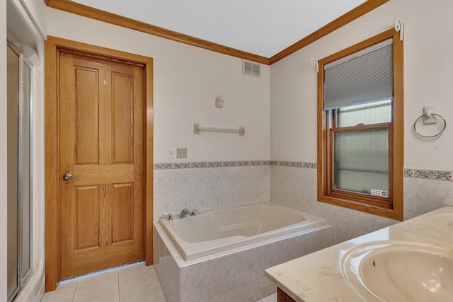 22 13th St S, Sauk Rapids, MN 56379 - full bath with a garden tub, vanity, tile patterned flooring, crown molding, and tile walls