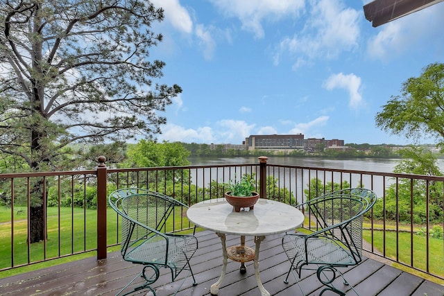 22 13th St S, Sauk Rapids, MN 56379 - wooden deck featuring a water view and a yard