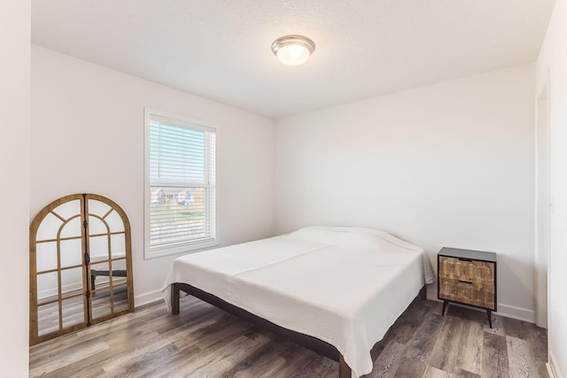 7145 208th Cv N, Forest Lake, MN 55025 - bedroom with wood finished floors and baseboards