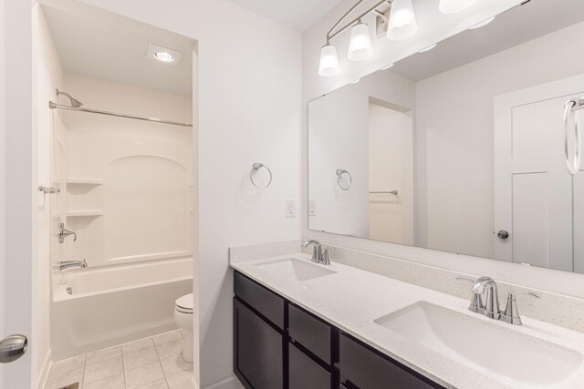 7145 208th Cv N, Forest Lake, MN 55025 - full bathroom featuring toilet,  shower combination, double vanity, and tile patterned floors